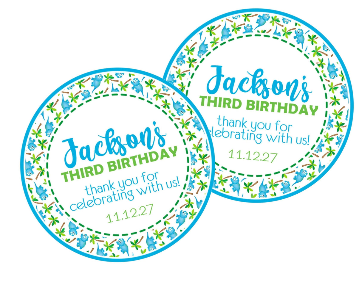 Blue and green baby dinosaur birthday sticker with personalized text