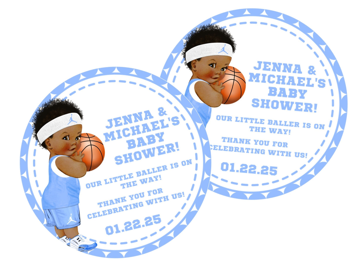 Blue basketball baby shower sticker featuring baby boy holding basketball