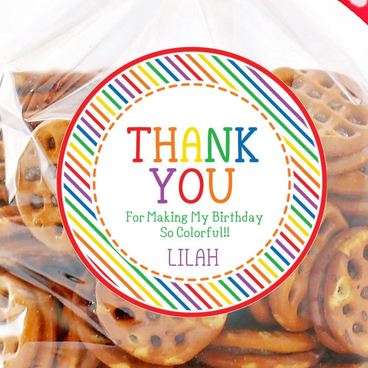 Bright rainbow birthday sticker with bold stripes and personalized name