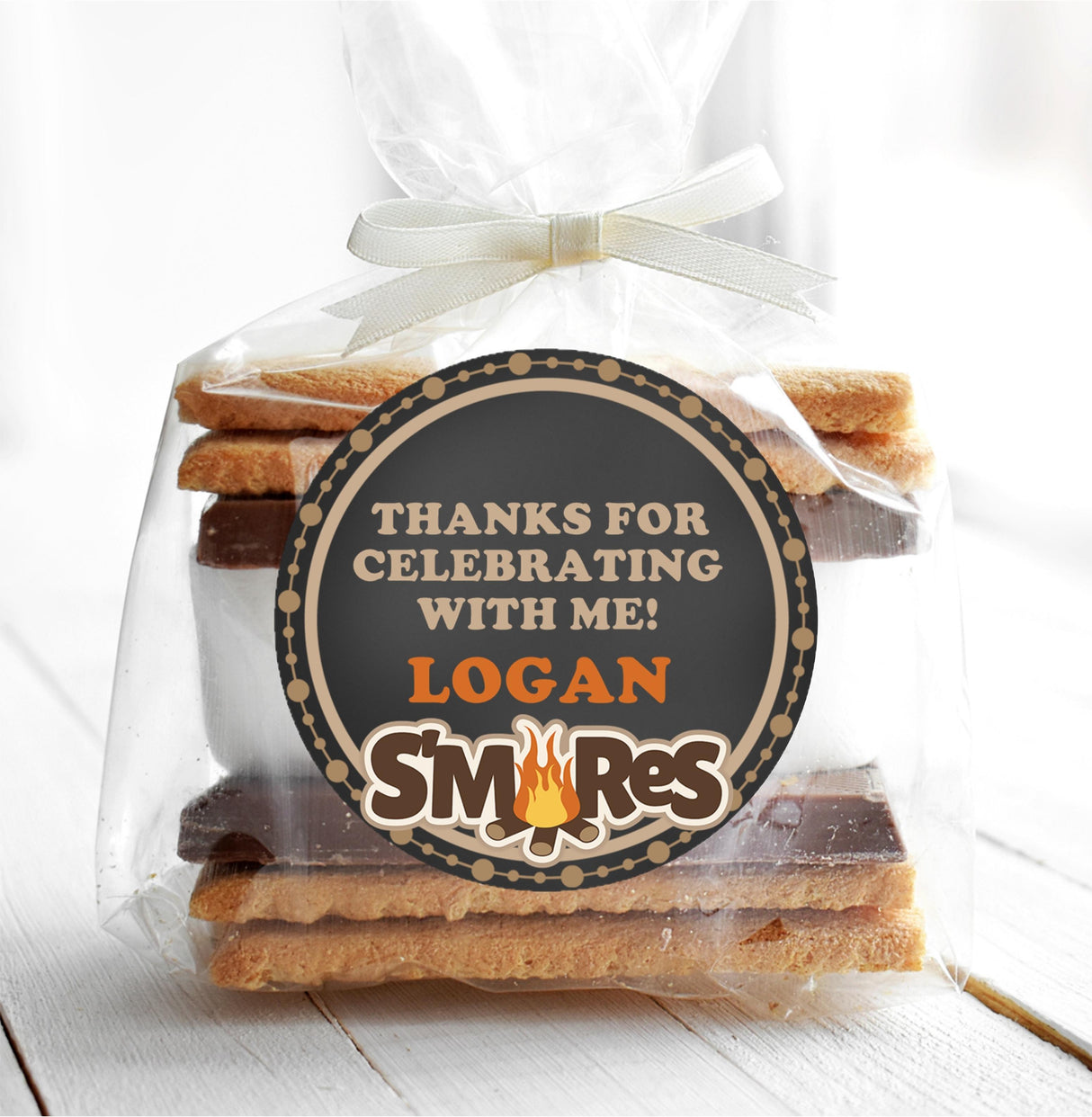 Dark camping birthday label with bold S’mores theme artwork
