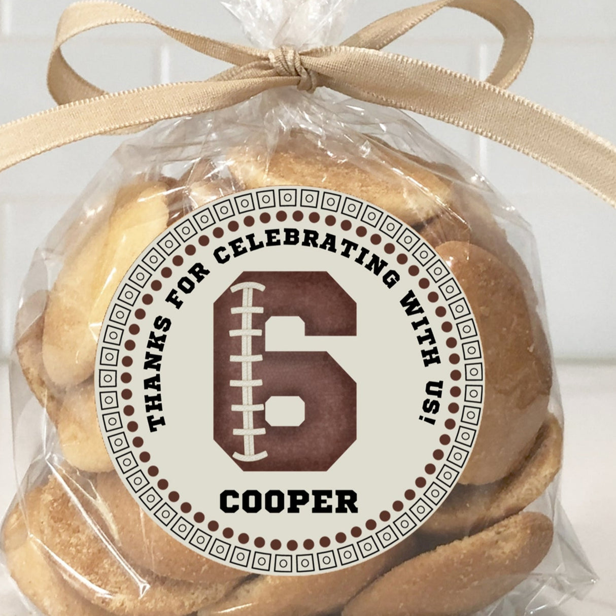 Football birthday sticker with stitched number and circle border
