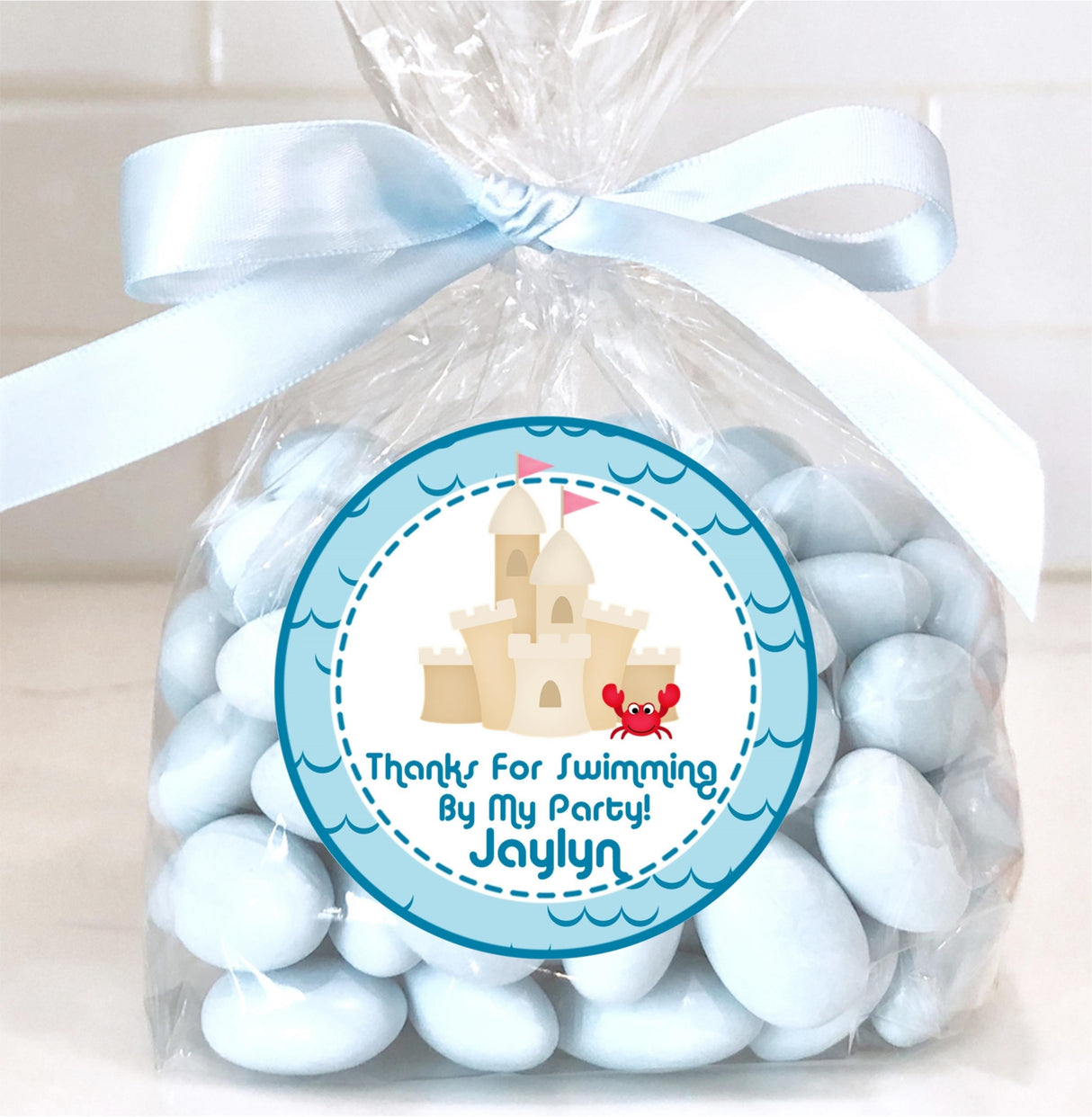 Kids’ beach theme birthday sticker in blue tones