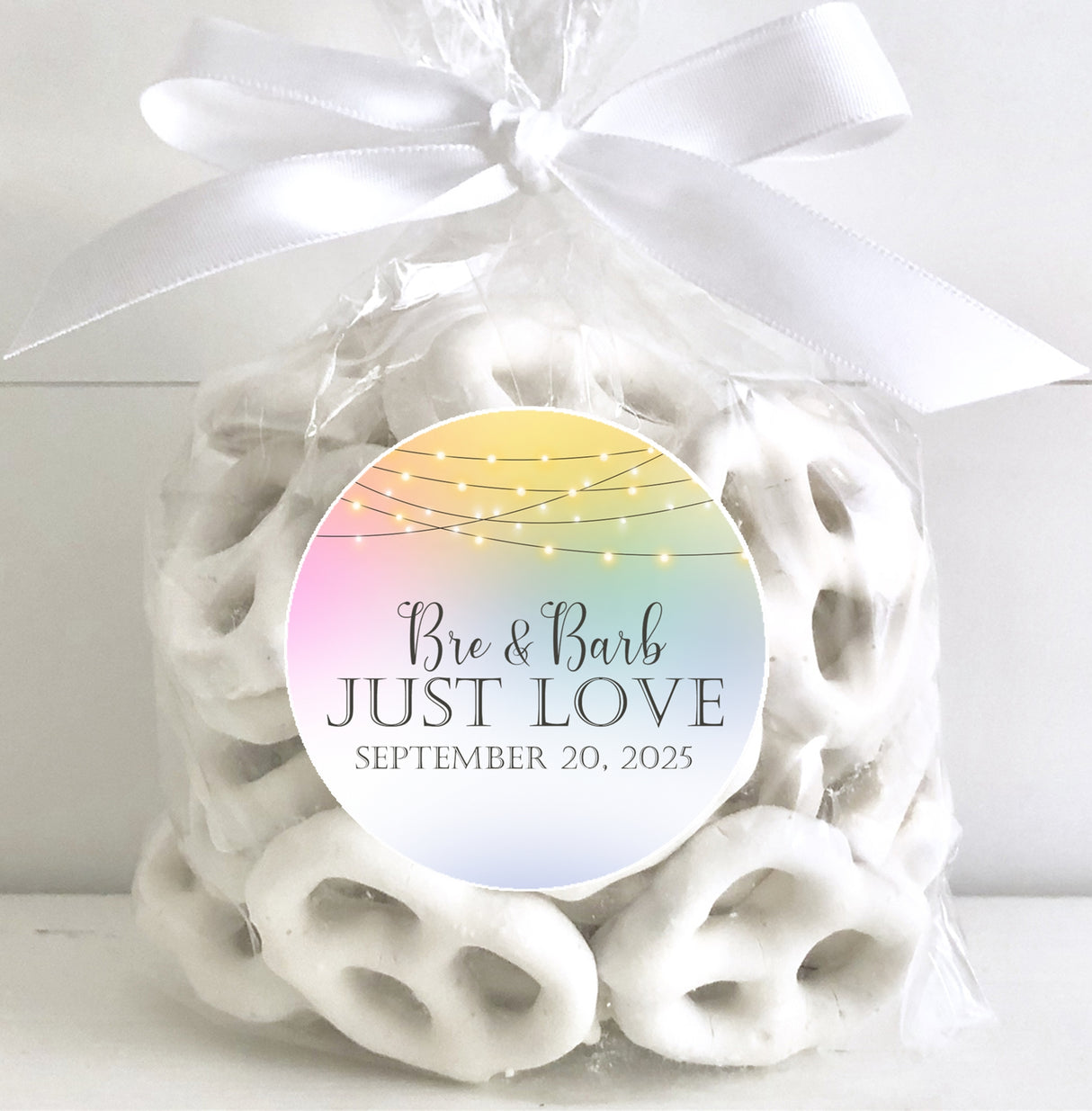 Modern wedding label with pastel gradient and bistro lights