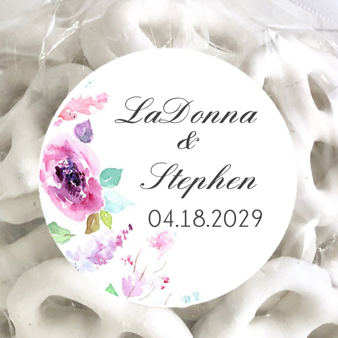 Personalized watercolor pink floral wedding stickers with names and wedding date.