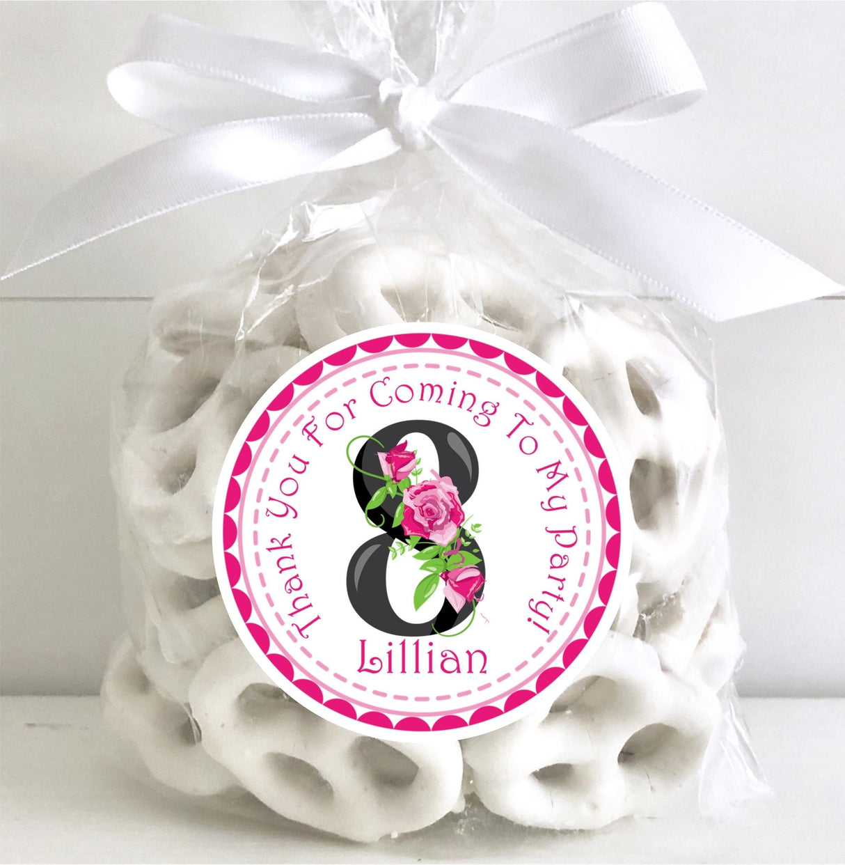 Pink and black party sticker label