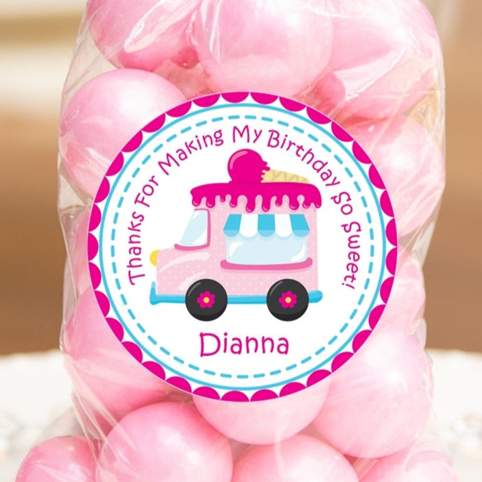 Pink ice cream truck birthday sticker with pink dotted border and cone on top.