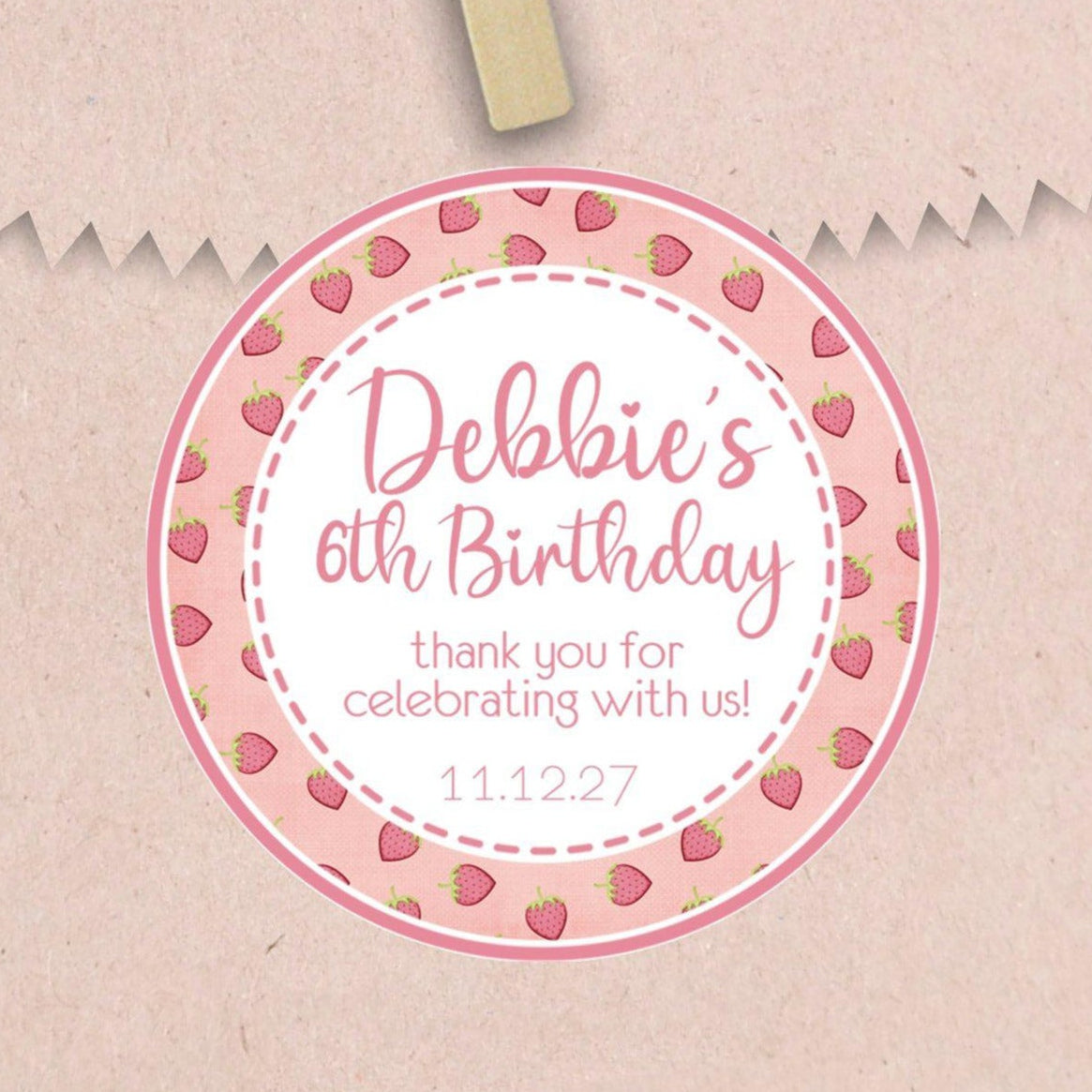 Pink strawberry birthday sticker with berry border