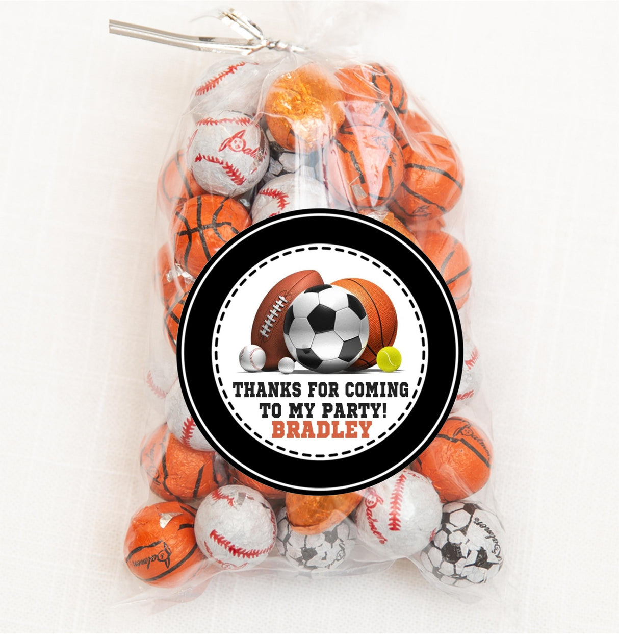 Sports-themed thank-you sticker featuring soccer, football, basketball, baseball, and tennis balls