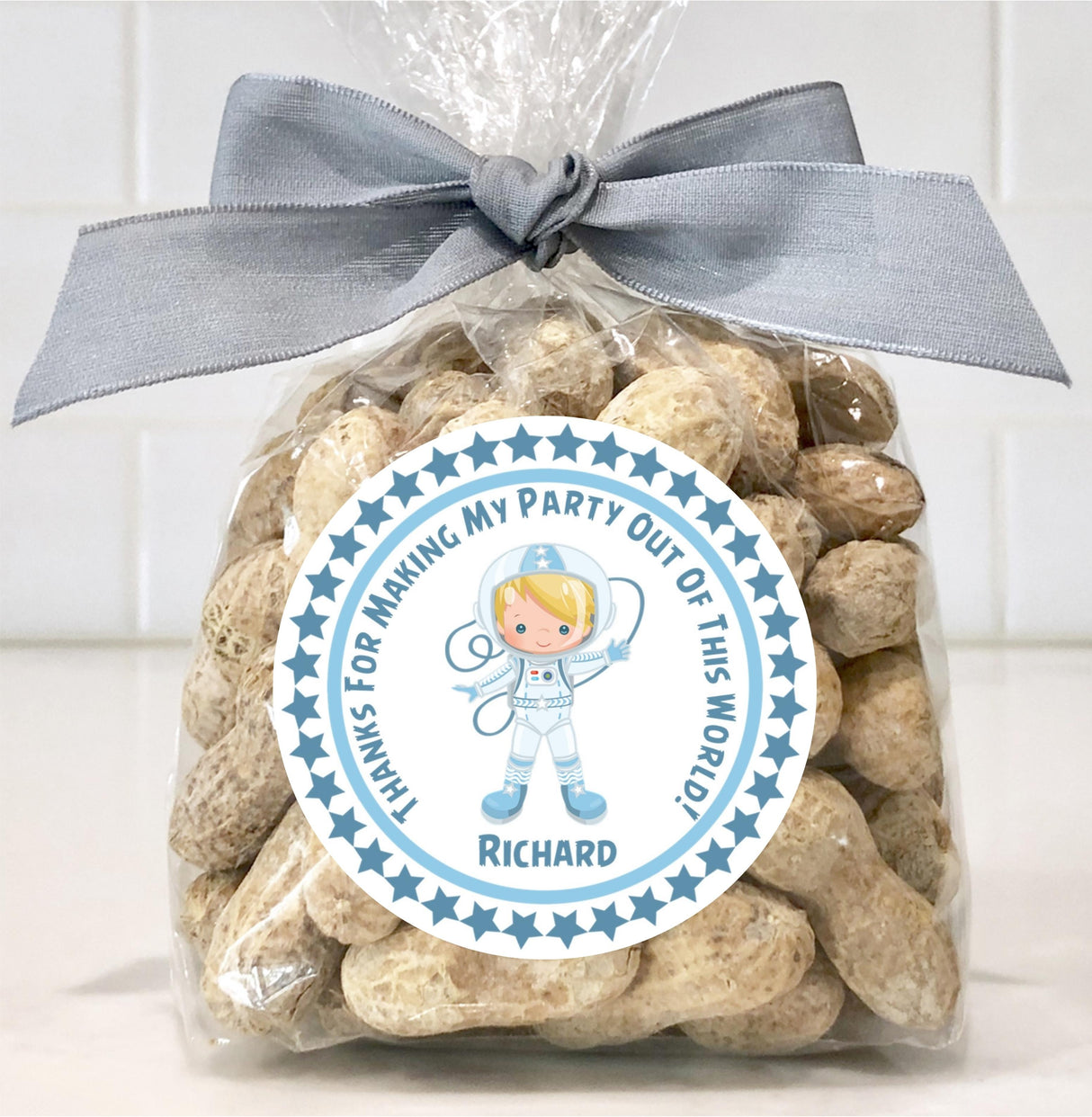 blue and white astronaut theme birthday sticker