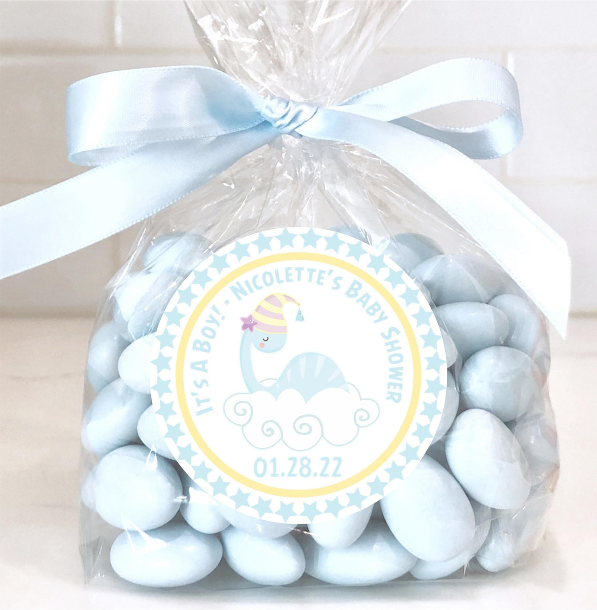 blue dino baby shower sticker with stars and clouds