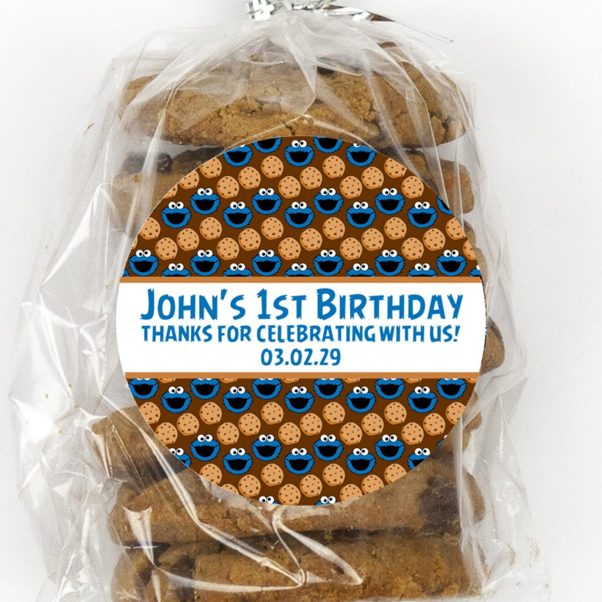 brown and blue cookie birthday sticker with cookie monster style faces
