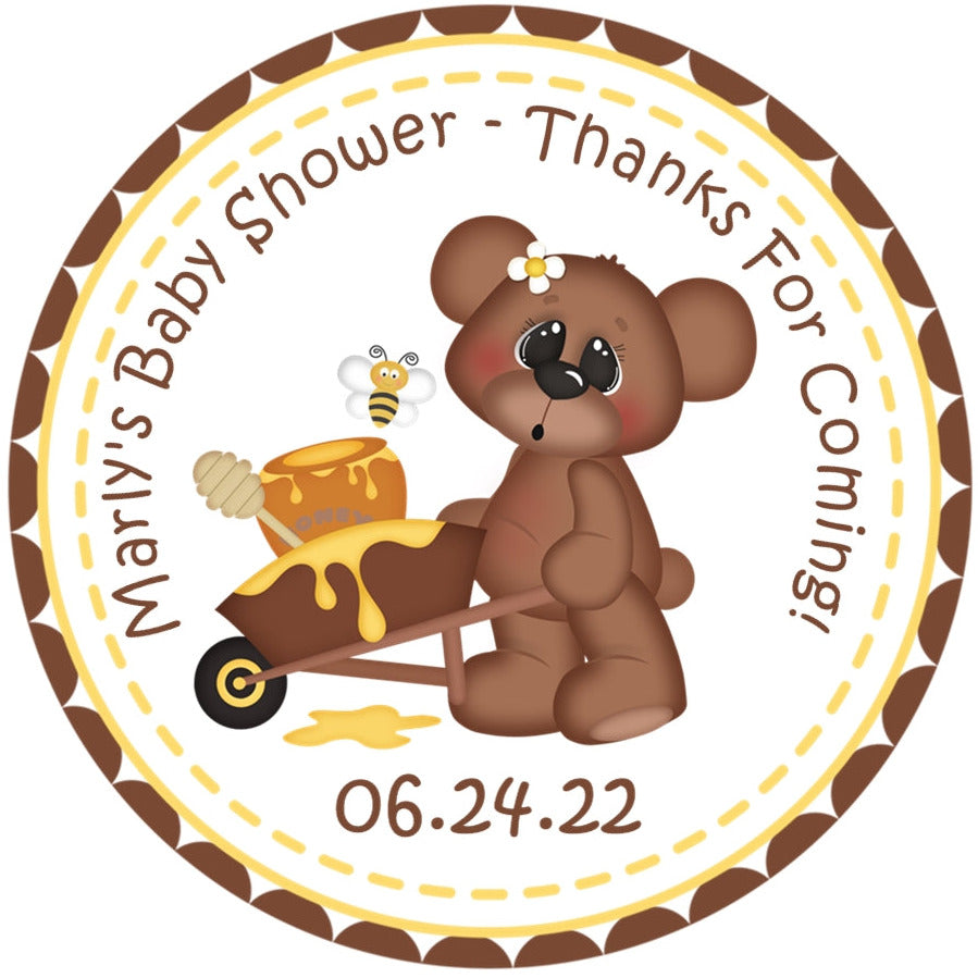 bumble bee baby shower sticker with teddy bear pushing honey wheelbarrow and dripping honey design