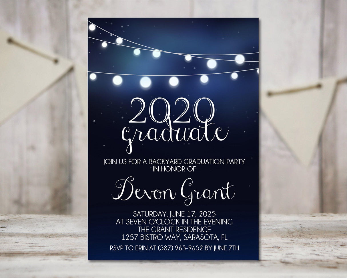 Backyard graduation invitation featuring navy background and glowing café lights