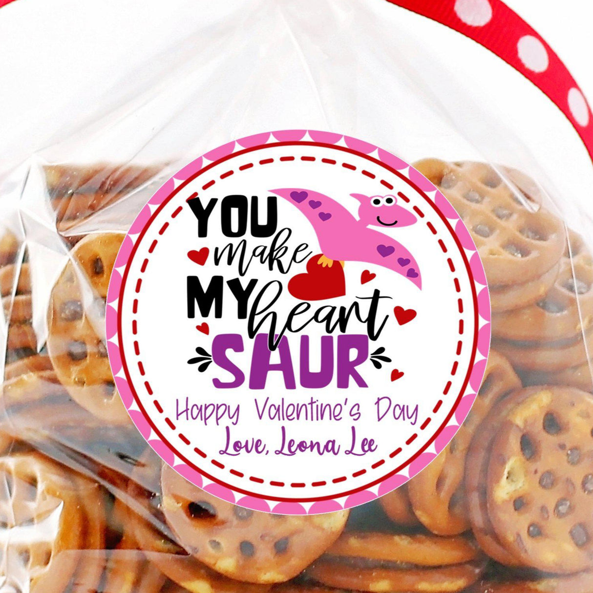 Pink dinosaur Valentine sticker with hearts