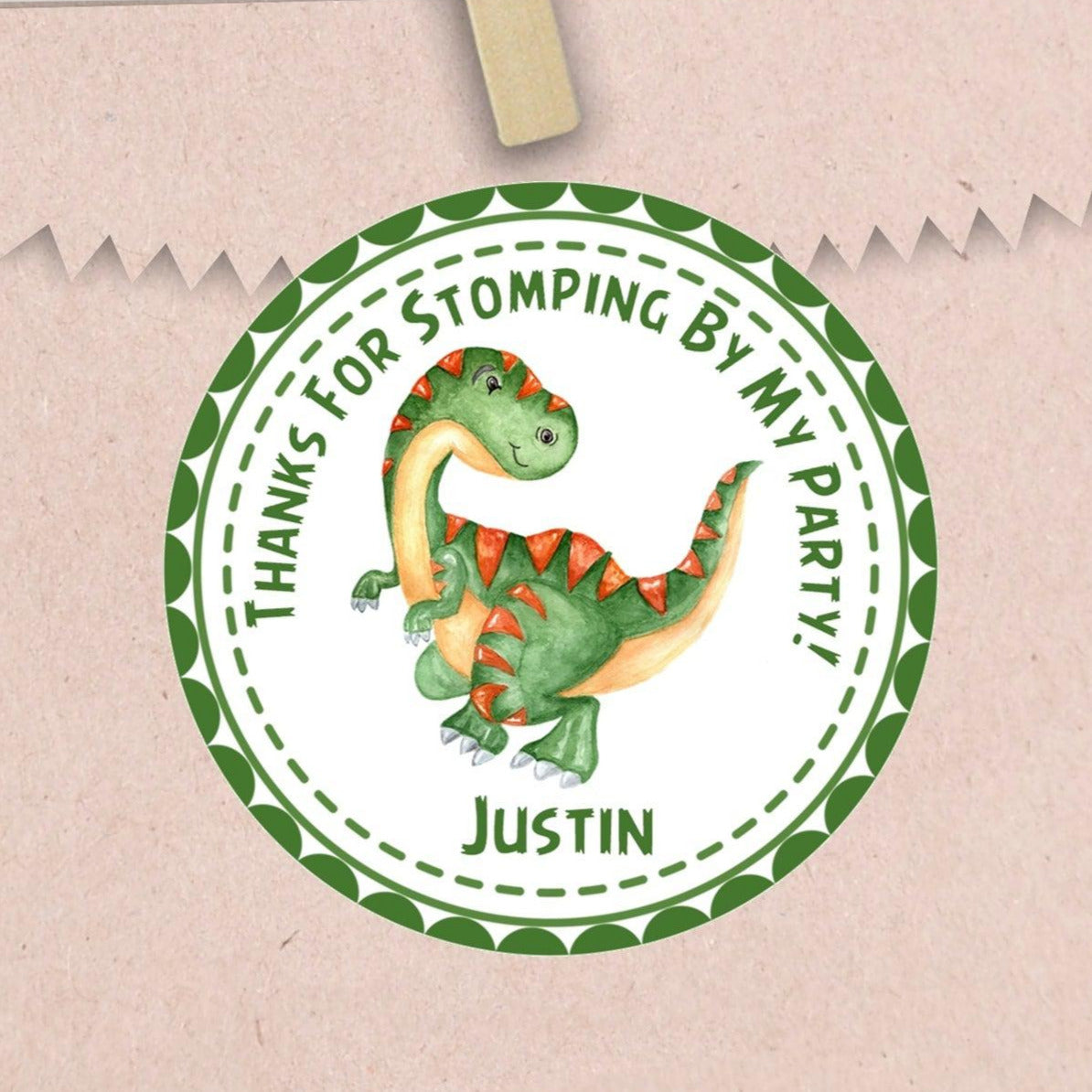 green dinosaur birthday sticker with orange spikes
