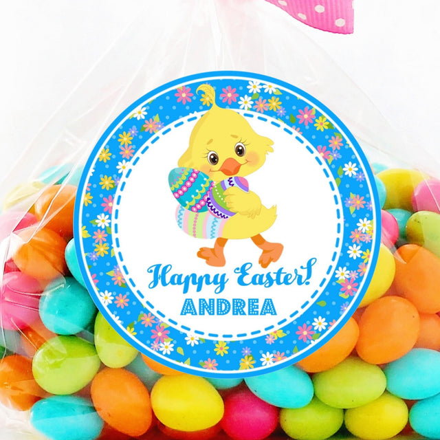 Blue Easter chick sticker holding colorful Easter eggs