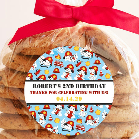 Blue firefighter birthday sticker with Dalmatian and firetruck pattern