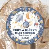 Blue outer space baby shower sticker with rockets and planets