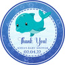 Blue whale baby shower sticker with underwater bubbles and wave background