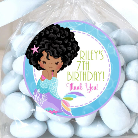 Brown-skinned mermaid birthday sticker with aqua tail and pastel background