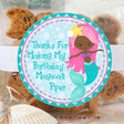 Brown mermaid birthday sticker with pink hair and teal fin