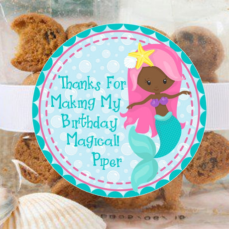 Brown mermaid birthday sticker with pink hair and teal fin