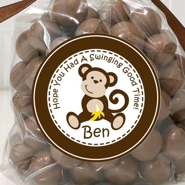 Brown monkey birthday sticker with banana