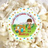 Camping boy birthday sticker with camper and forest background