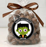 Cartoon Frankenstein head Halloween sticker with playful spooky design