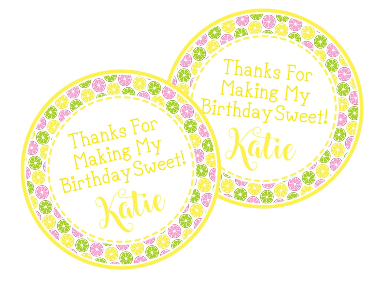 Citrus slice birthday sticker with pink yellow and green fruit