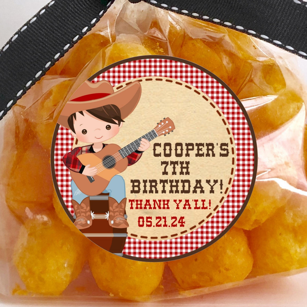 Cowboy birthday sticker with guitar and red gingham background