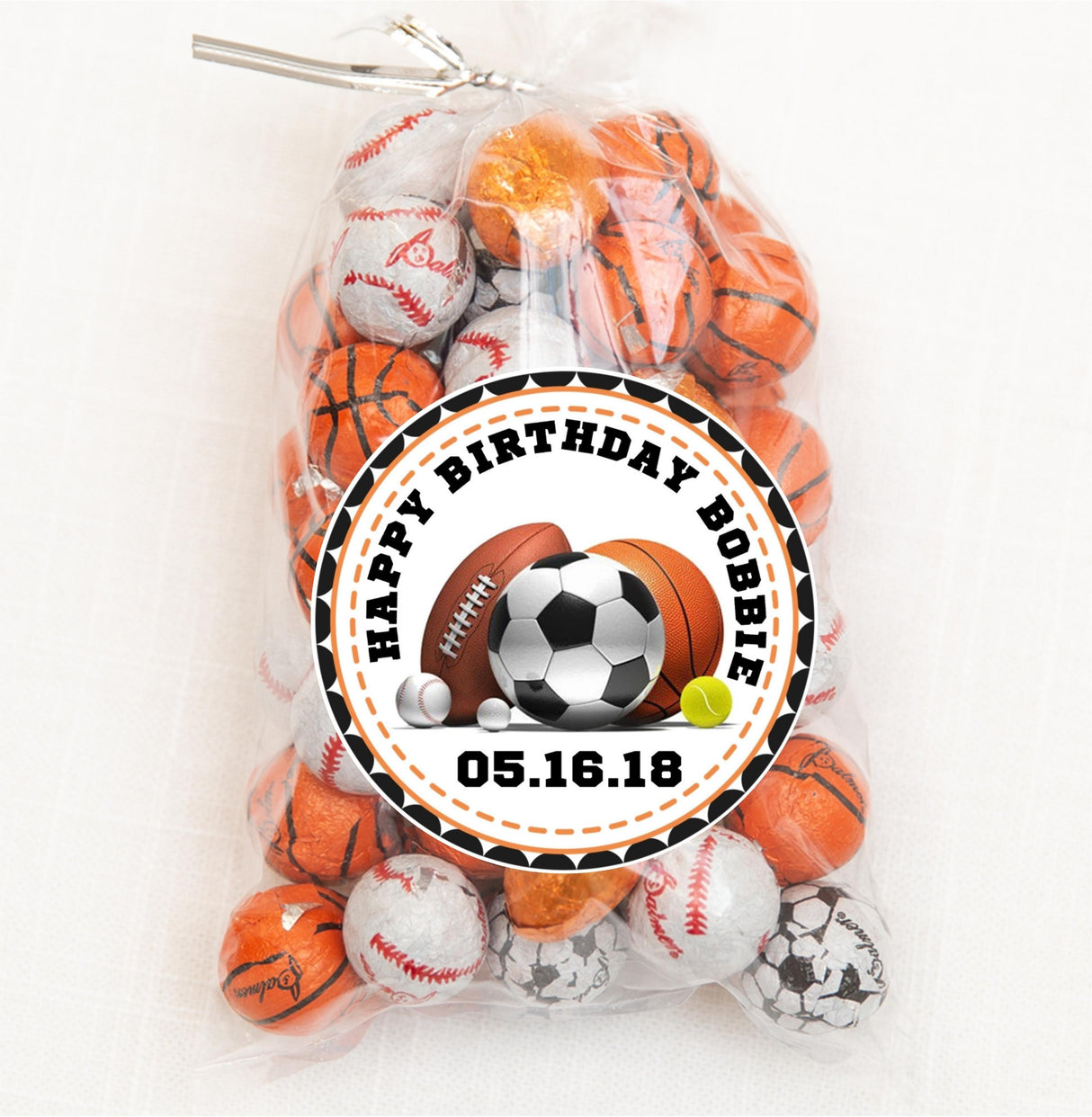 Custom sports ball birthday sticker with black and orange border