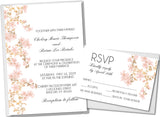 Elegant blush floral wedding invitation featuring soft cherry blossoms on a white background.