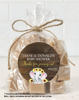 Sunflower elephant baby shower stickers on rustic wood background