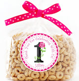 Girls first birthday favor label with pink floral design