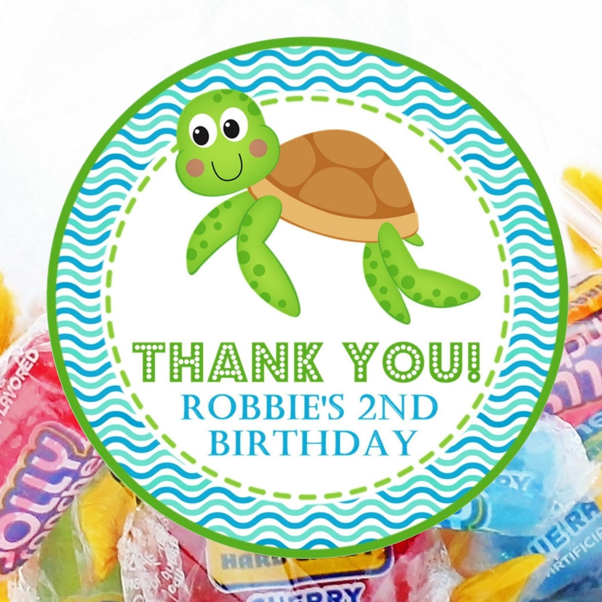 Green sea turtle birthday sticker with aqua wave background