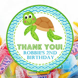 Green sea turtle birthday sticker with aqua wave background