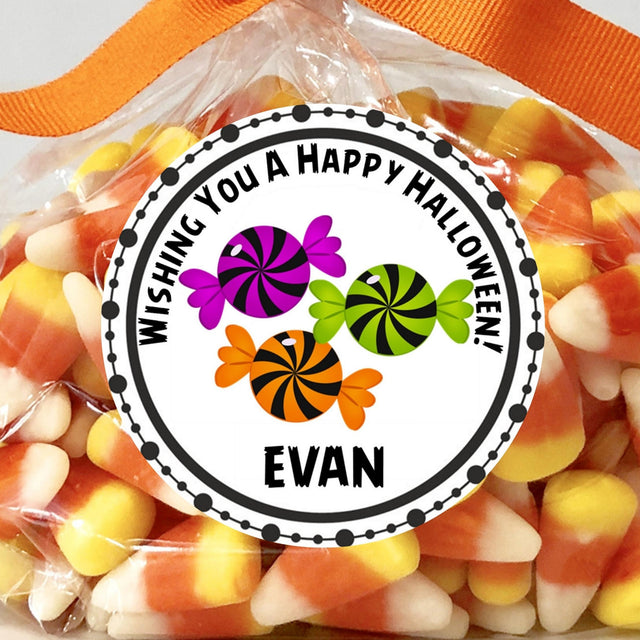 Halloween candy sticker with purple orange and green wrapped sweets