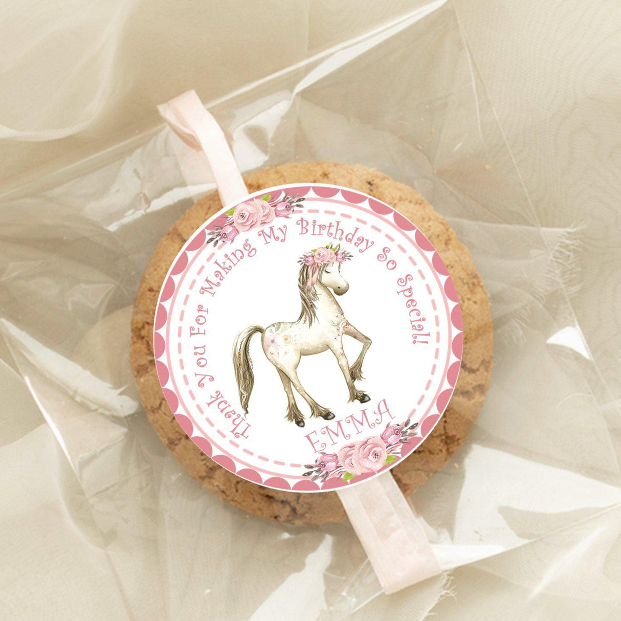 Horse-themed birthday favor sticker in pink tones