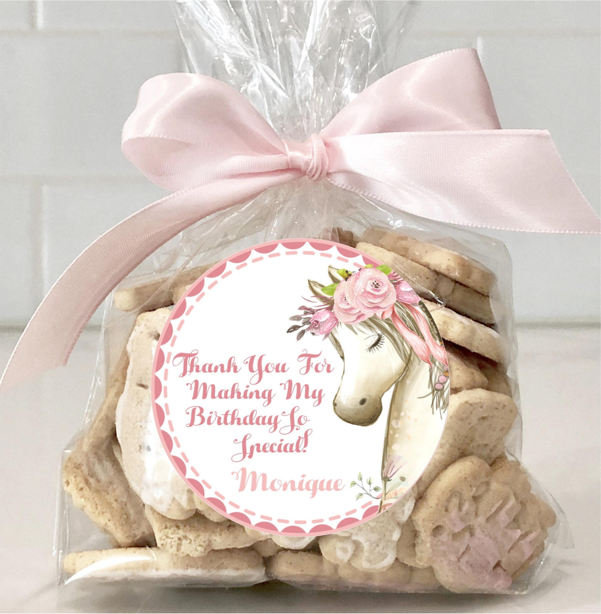 Horse-themed birthday sticker in pink tones