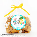 Island-themed first birthday sticker with pineapple and tropical flowers