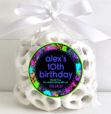 Neon paintball birthday sticker on black background with custom text