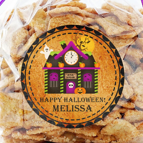 Orange haunted house Halloween sticker with spooky details