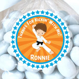 Orange karate boy sticker with martial arts jump pose