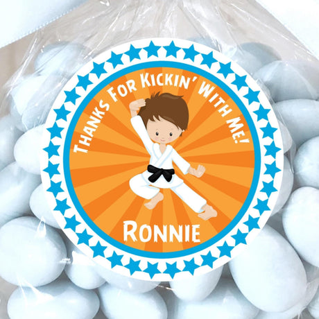 Orange karate boy sticker with martial arts jump pose