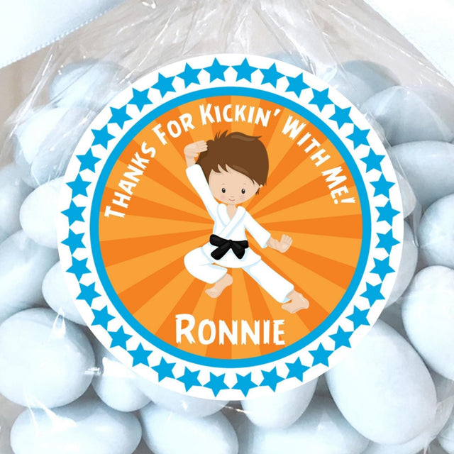 Orange karate boy sticker with martial arts jump pose