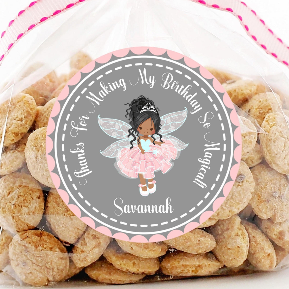 Pink and grey fairy birthday sticker with personalized name and tutu fairy illustration.