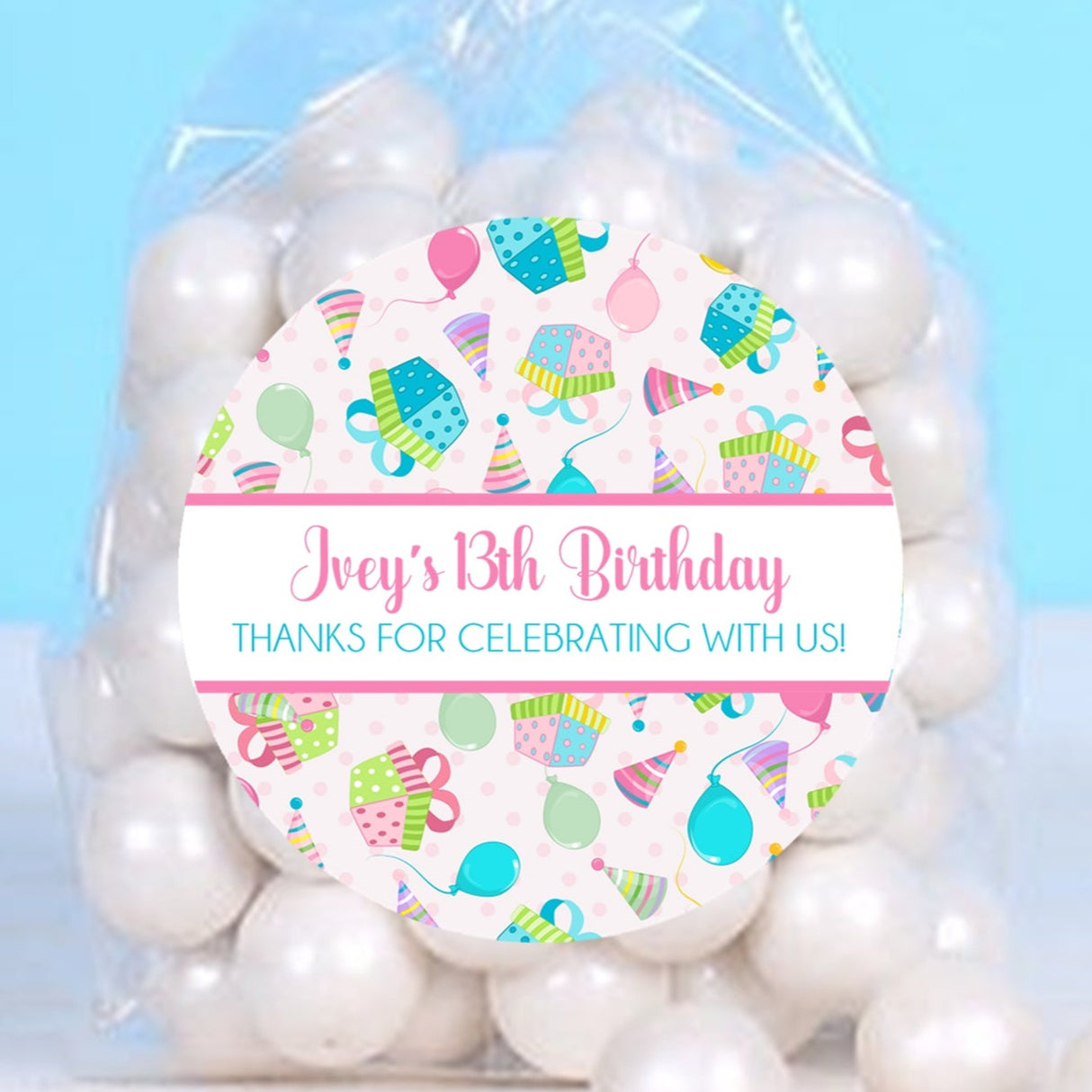 Pink birthday present stickers with colorful gift boxes and balloons