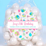 Pink birthday present stickers with colorful gift boxes and balloons