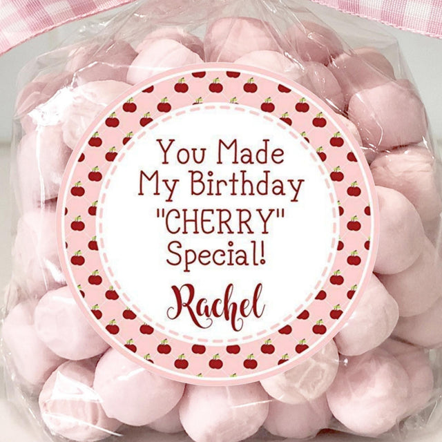 Pink cherry birthday sticker with plaid background